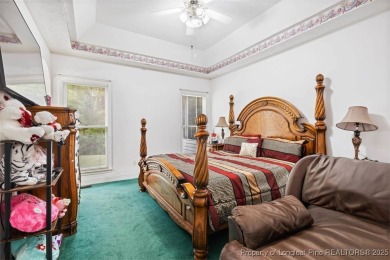 This beautifully maintained 3-bedroom, 3-bath all-brick home is on Baywood Golf Club in North Carolina - for sale on GolfHomes.com, golf home, golf lot