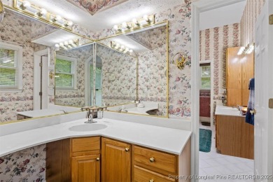 This beautifully maintained 3-bedroom, 3-bath all-brick home is on Baywood Golf Club in North Carolina - for sale on GolfHomes.com, golf home, golf lot