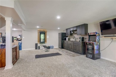 This updated home is in a quiet Park Hill School cul-de-sac on National Golf Club of Kansas City in Missouri - for sale on GolfHomes.com, golf home, golf lot