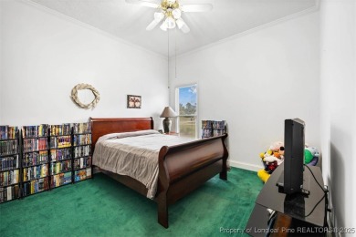 This beautifully maintained 3-bedroom, 3-bath all-brick home is on Baywood Golf Club in North Carolina - for sale on GolfHomes.com, golf home, golf lot