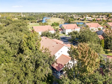 Welcome to this light and bright end-unit condo in the highly on The Preserve Golf Club At Tara in Florida - for sale on GolfHomes.com, golf home, golf lot