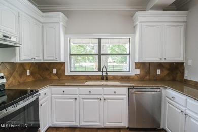 Move in ready and right on Deerfield Golf Course, this house has on Colonial Country Club Deerfield in Mississippi - for sale on GolfHomes.com, golf home, golf lot