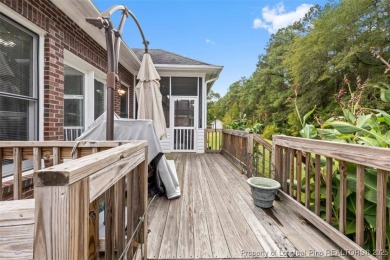 This beautifully maintained 3-bedroom, 3-bath all-brick home is on Baywood Golf Club in North Carolina - for sale on GolfHomes.com, golf home, golf lot