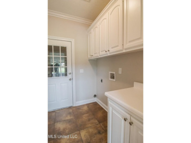 Move in ready and right on Deerfield Golf Course, this house has on Colonial Country Club Deerfield in Mississippi - for sale on GolfHomes.com, golf home, golf lot