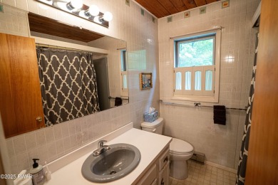 Discover this spacious contemporary home tucked away on a quiet on The Hideout Golf in Pennsylvania - for sale on GolfHomes.com, golf home, golf lot