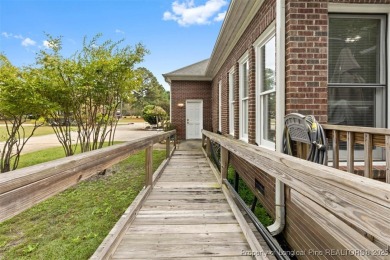 This beautifully maintained 3-bedroom, 3-bath all-brick home is on Baywood Golf Club in North Carolina - for sale on GolfHomes.com, golf home, golf lot
