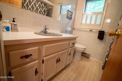 Discover this spacious contemporary home tucked away on a quiet on The Hideout Golf in Pennsylvania - for sale on GolfHomes.com, golf home, golf lot