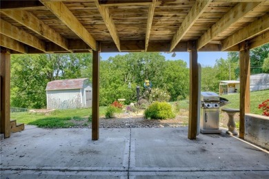 This updated home is in a quiet Park Hill School cul-de-sac on National Golf Club of Kansas City in Missouri - for sale on GolfHomes.com, golf home, golf lot