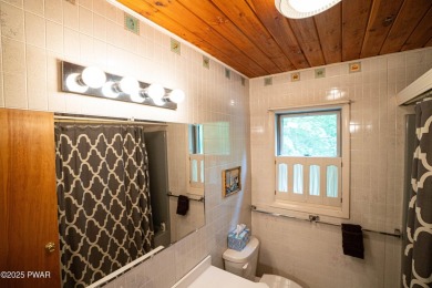 Discover this spacious contemporary home tucked away on a quiet on The Hideout Golf in Pennsylvania - for sale on GolfHomes.com, golf home, golf lot
