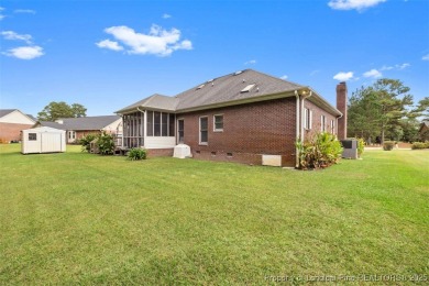 This beautifully maintained 3-bedroom, 3-bath all-brick home is on Baywood Golf Club in North Carolina - for sale on GolfHomes.com, golf home, golf lot