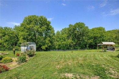 This updated home is in a quiet Park Hill School cul-de-sac on National Golf Club of Kansas City in Missouri - for sale on GolfHomes.com, golf home, golf lot