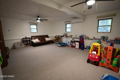 Discover this spacious contemporary home tucked away on a quiet on The Hideout Golf in Pennsylvania - for sale on GolfHomes.com, golf home, golf lot