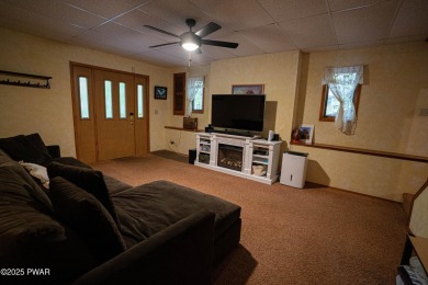 Discover this spacious contemporary home tucked away on a quiet on The Hideout Golf in Pennsylvania - for sale on GolfHomes.com, golf home, golf lot