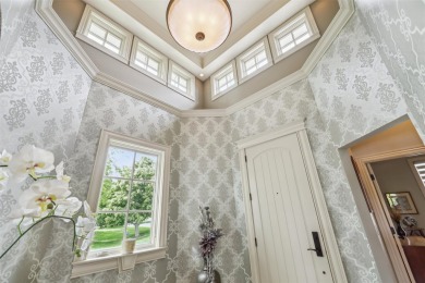 Discover refined elegance in this exceptional walkout ranch on Glen Oaks Country Club in Iowa - for sale on GolfHomes.com, golf home, golf lot
