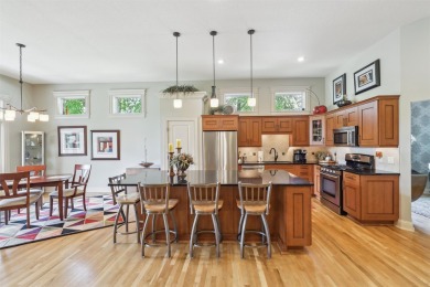 Discover refined elegance in this exceptional walkout ranch on Glen Oaks Country Club in Iowa - for sale on GolfHomes.com, golf home, golf lot