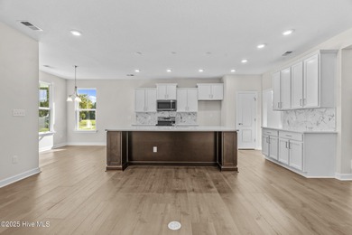 Be prepared to be WOWED with this luxury lifestyle. Premier on Sound Golf Links at Albemarle Plantation in North Carolina - for sale on GolfHomes.com, golf home, golf lot