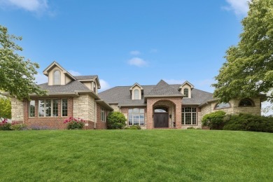 Welcome to luxury living in this stunning 4-bedroom, brick on Glen Oaks Country Club in Iowa - for sale on GolfHomes.com, golf home, golf lot