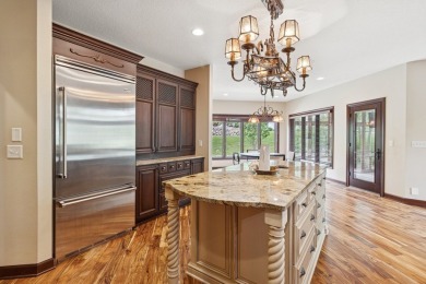 Welcome to luxury living in this stunning 4-bedroom, brick on Glen Oaks Country Club in Iowa - for sale on GolfHomes.com, golf home, golf lot