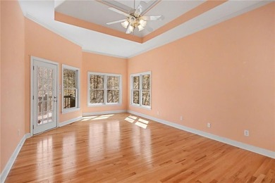 Step into a home where charm and serenity come together on Chapel Hills Golf and Country Club in Georgia - for sale on GolfHomes.com, golf home, golf lot