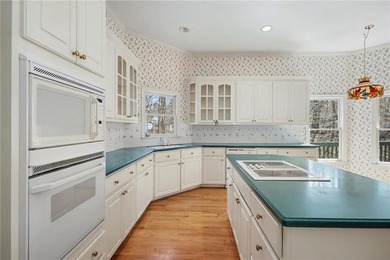 Step into a home where charm and serenity come together on Chapel Hills Golf and Country Club in Georgia - for sale on GolfHomes.com, golf home, golf lot