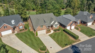 Take a look at this stunning, well maintained brick home on Cowans Ford Country Club in North Carolina - for sale on GolfHomes.com, golf home, golf lot