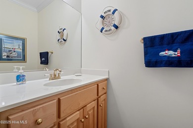 Immaculate, three-bedroom 2.5 bath custom-built home in the on Sound Golf Links at Albemarle Plantation in North Carolina - for sale on GolfHomes.com, golf home, golf lot