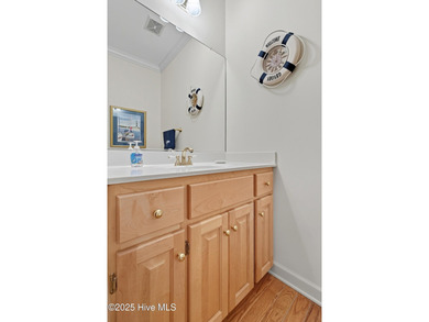 Immaculate, three-bedroom 2.5 bath custom-built home in the on Sound Golf Links at Albemarle Plantation in North Carolina - for sale on GolfHomes.com, golf home, golf lot