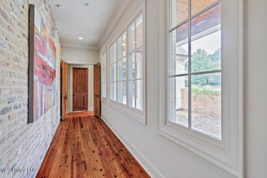 Amazing home on the 3rd fairway at Reunion. Spacious living room on Reunion Golf Club in Mississippi - for sale on GolfHomes.com, golf home, golf lot