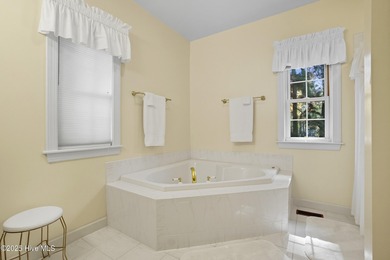 Immaculate, three-bedroom 2.5 bath custom-built home in the on Sound Golf Links at Albemarle Plantation in North Carolina - for sale on GolfHomes.com, golf home, golf lot