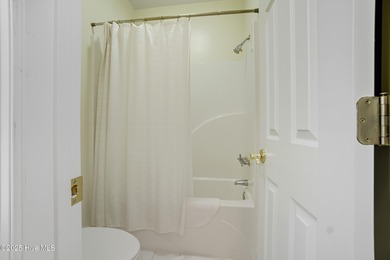 Immaculate, three-bedroom 2.5 bath custom-built home in the on Sound Golf Links at Albemarle Plantation in North Carolina - for sale on GolfHomes.com, golf home, golf lot