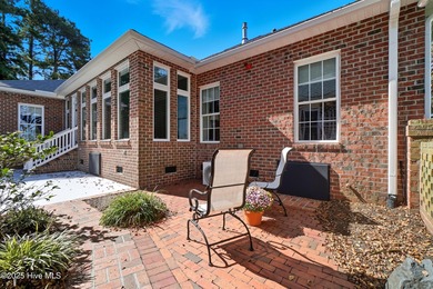 Immaculate, three-bedroom 2.5 bath custom-built home in the on Sound Golf Links at Albemarle Plantation in North Carolina - for sale on GolfHomes.com, golf home, golf lot