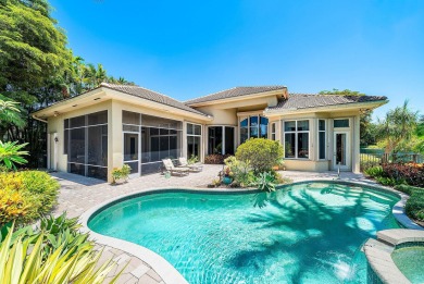 Luxury meets tranquility in this stunning 3,794sf 4-bedroom on BallenIsles Golf and Country Club in Florida - for sale on GolfHomes.com, golf home, golf lot
