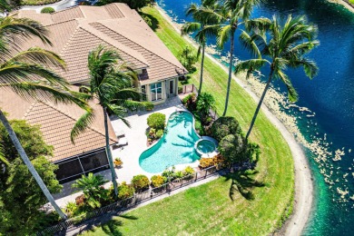 Luxury meets tranquility in this stunning 3,794sf 4-bedroom on BallenIsles Golf and Country Club in Florida - for sale on GolfHomes.com, golf home, golf lot