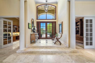 Luxury meets tranquility in this stunning 3,794sf 4-bedroom on BallenIsles Golf and Country Club in Florida - for sale on GolfHomes.com, golf home, golf lot