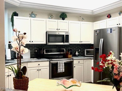 ENJOY PEACEFUL and Tranquil Lake Views in this First Floor 2 on Colonial Country Club in Florida - for sale on GolfHomes.com, golf home, golf lot