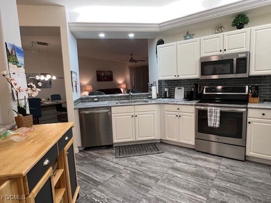 ENJOY PEACEFUL and Tranquil Lake Views in this First Floor 2 on Colonial Country Club in Florida - for sale on GolfHomes.com, golf home, golf lot