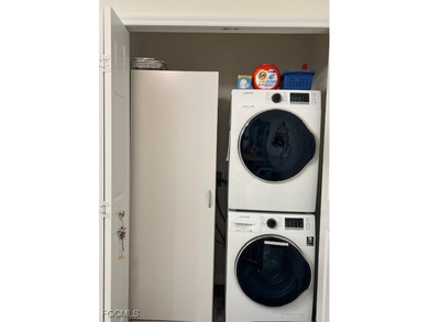 ENJOY PEACEFUL and Tranquil Lake Views in this First Floor 2 on Colonial Country Club in Florida - for sale on GolfHomes.com, golf home, golf lot