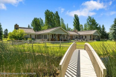 Immerse yourself in a private Jackson Hole estate, surrounded by on Jackson Hole Golf and Tennis Club in Wyoming - for sale on GolfHomes.com, golf home, golf lot