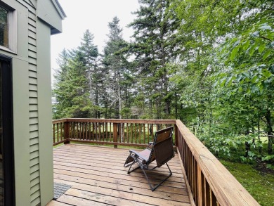 Spacious end unit townhouse overlooking the 1st Fairway at The on Hermitage Club Golf Course in Vermont - for sale on GolfHomes.com, golf home, golf lot