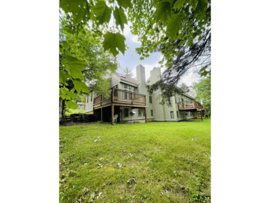 Spacious end unit townhouse overlooking the 1st Fairway at The on Hermitage Club Golf Course in Vermont - for sale on GolfHomes.com, golf home, golf lot