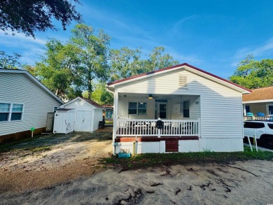 JUST LISTED! WELL CONSTRUCTED STICKBUILT BEACH HOUSE CENTRALLY on Prestwick Country Club in South Carolina - for sale on GolfHomes.com, golf home, golf lot