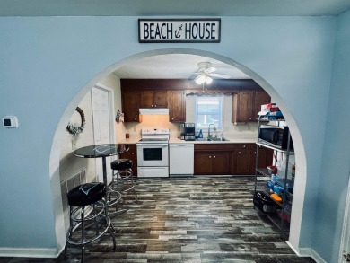 JUST LISTED! WELL CONSTRUCTED STICKBUILT BEACH HOUSE CENTRALLY on Prestwick Country Club in South Carolina - for sale on GolfHomes.com, golf home, golf lot
