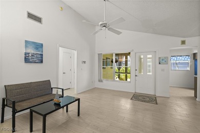 Welcome to this beautifully maintained Jasmine floor plan villa on Myerlee Country Club in Florida - for sale on GolfHomes.com, golf home, golf lot