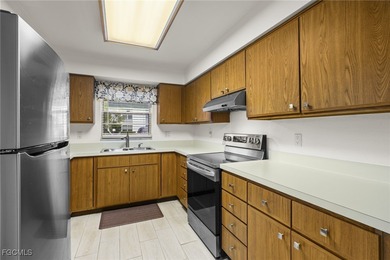 Welcome to this beautifully maintained Jasmine floor plan villa on Myerlee Country Club in Florida - for sale on GolfHomes.com, golf home, golf lot