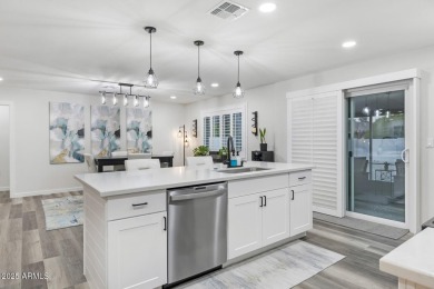 Welcome to an exquisitely renovated residence in the vibrant Sun on Deer Valley Golf Course in Arizona - for sale on GolfHomes.com, golf home, golf lot