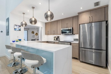 Welcome to your DREAM villa! This COMPLETELY updated 3-bedroom on Twin Isles Country Club in Florida - for sale on GolfHomes.com, golf home, golf lot