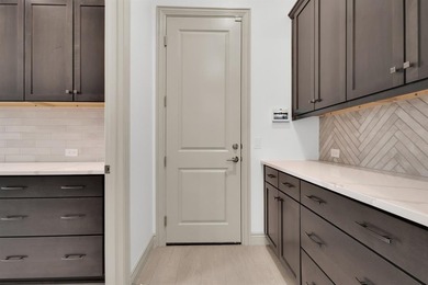 A Masterpiece on the North 5th Tee Box -- The Avalon at its on Wildhorse Golf Club of Robson Ranch in Texas - for sale on GolfHomes.com, golf home, golf lot