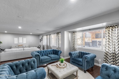 Beautifully updated 5-bedroom, 3-bath home tucked into a quiet on Arrowhead Country Club in Arizona - for sale on GolfHomes.com, golf home, golf lot