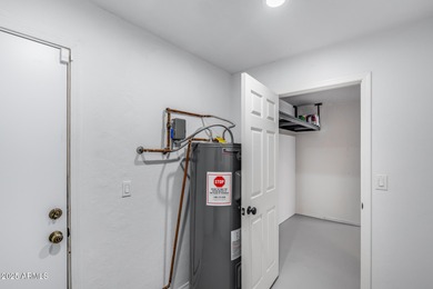 Beautifully updated 5-bedroom, 3-bath home tucked into a quiet on Arrowhead Country Club in Arizona - for sale on GolfHomes.com, golf home, golf lot