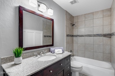 Beautifully updated 5-bedroom, 3-bath home tucked into a quiet on Arrowhead Country Club in Arizona - for sale on GolfHomes.com, golf home, golf lot